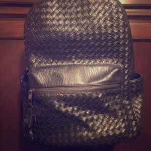 Black woven braided backpack